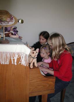 32PlayingGrettasPiano