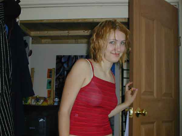 Danielle in front of her bedroom - (in Illinois we call this a closet)