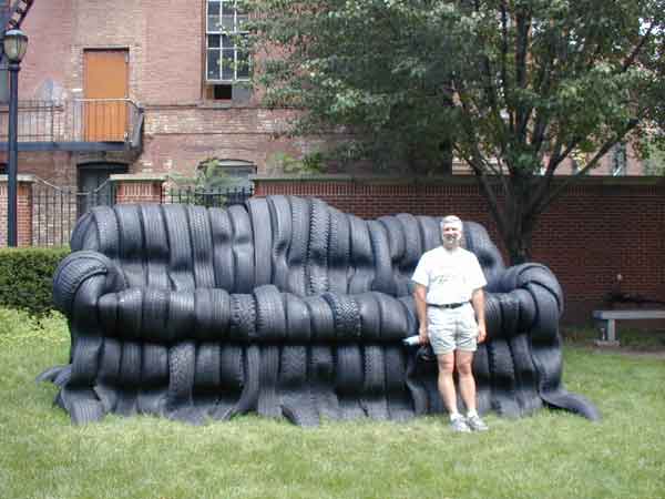 Rich on big chair made out of tires on the Pratt Campus