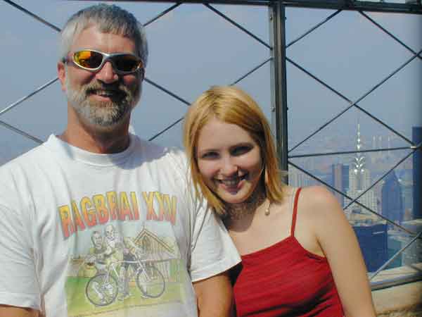 Danielle and I on top of the Empire State Building. Notice the Chrysler building off Danielle's left .